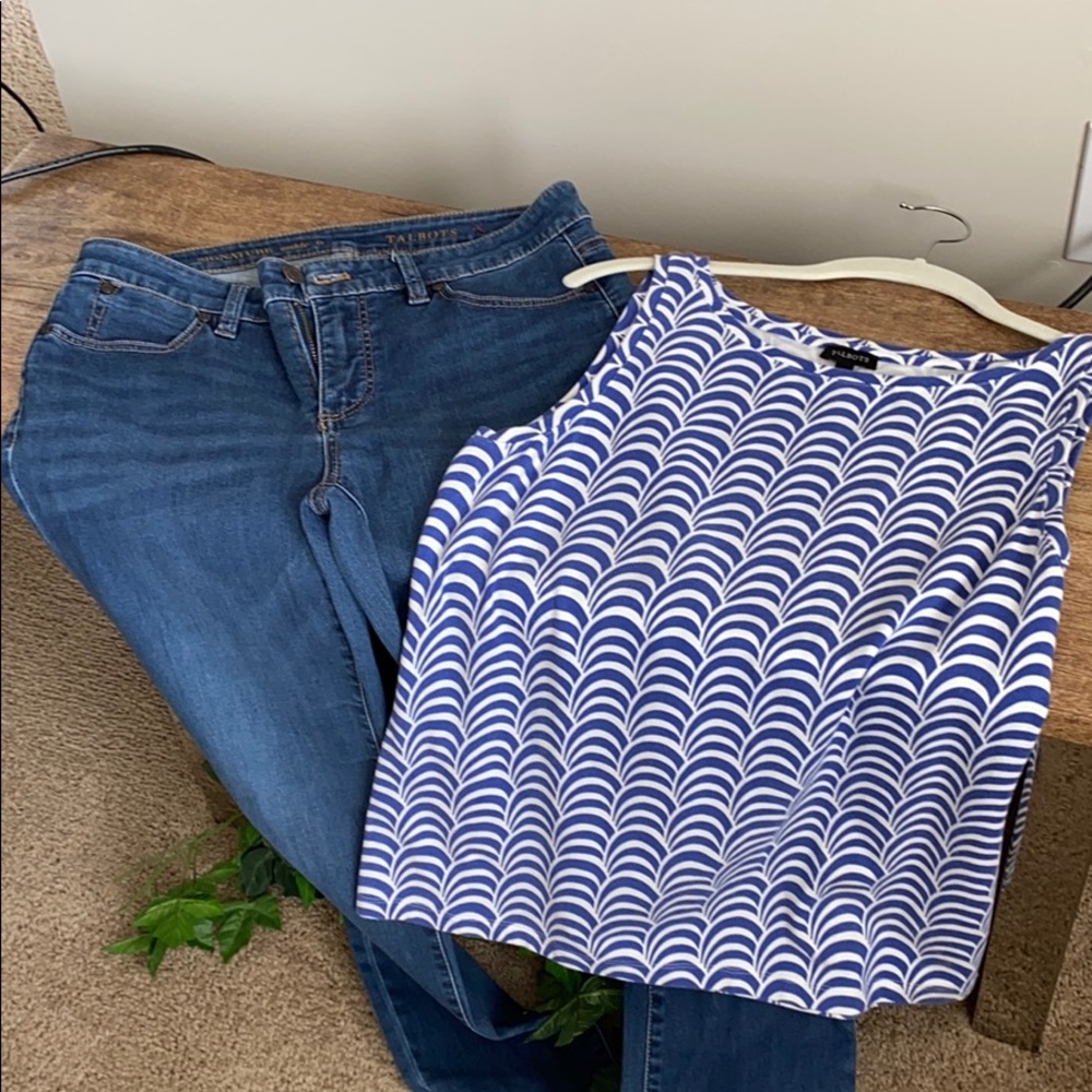 Jeans and sleeveless top.